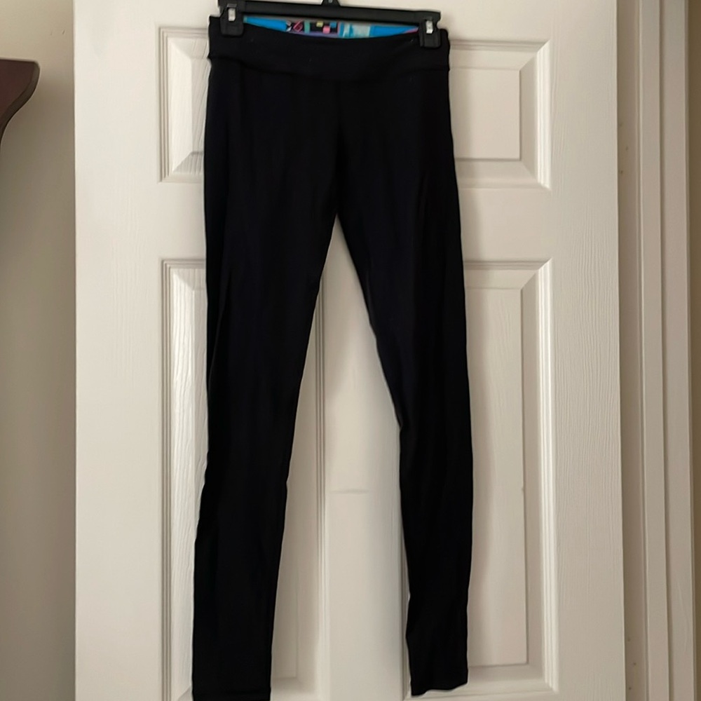 Ivivva Girls Leggings Reversible size 12 Solid Black or Multi Colored Waistband